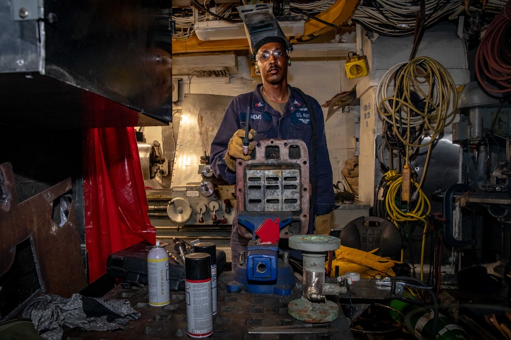 USS McFaul Hull Technician Conducts Maintenance