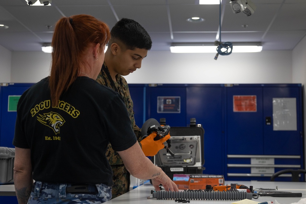 U.S. Marines and Australian Airmen Maintain Joint Strike Fighter Equipment together