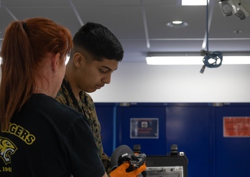U.S. Marines and Australian Airmen Maintain Joint Strike Fighter Equipment together