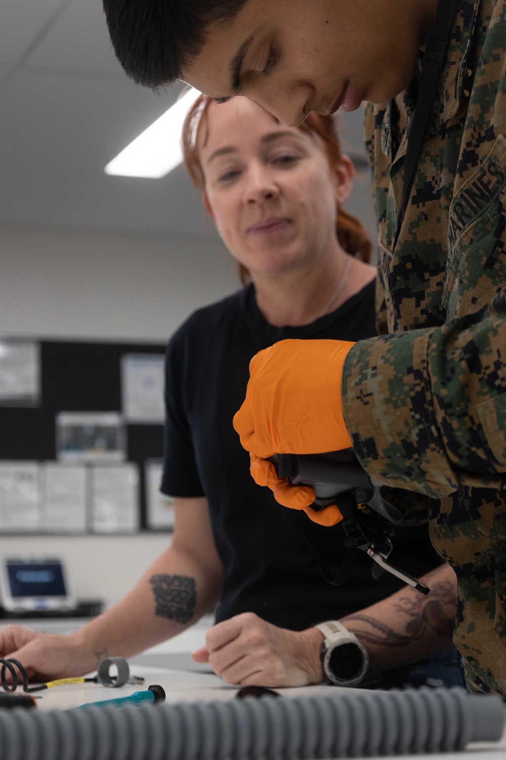 U.S. Marines and Australian Airmen Maintain Joint Strike Fighter Equipment together