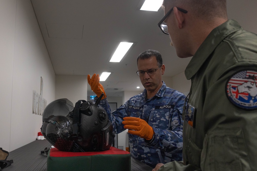 U.S. Marines and Australian Airmen Maintain Joint Strike Fighter Equipment together