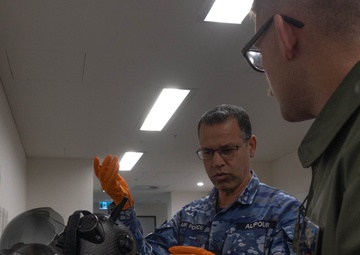 U.S. Marines and Australian Airmen Maintain Joint Strike Fighter Equipment together
