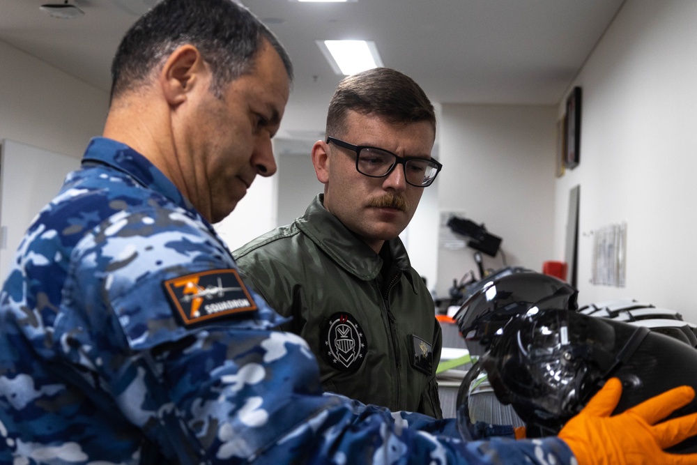 U.S. Marines and Australian Airmen Maintain Joint Strike Fighter Equipment together