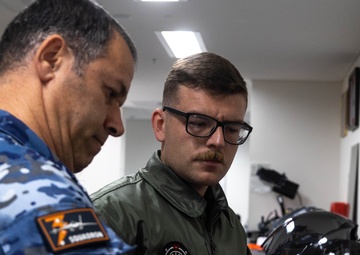 U.S. Marines and Australian Airmen Maintain Joint Strike Fighter Equipment together