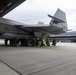 U.S Marines and Australian Airmen load CATM-120 Missiles together