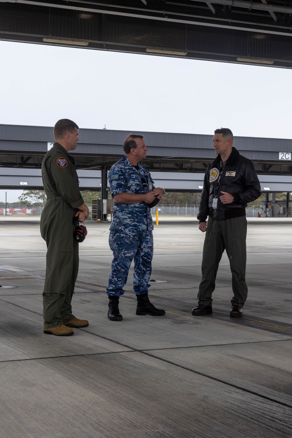 Australian Air Combat Group Commander and U.S. Marine Squadron Commander discuss bilateral training