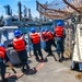 USS Robert Smalls (CG 62) Sailors Run the Line during RAS