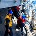 USS Robert Smalls (CG 62) Sailors Hold the Line during RAS