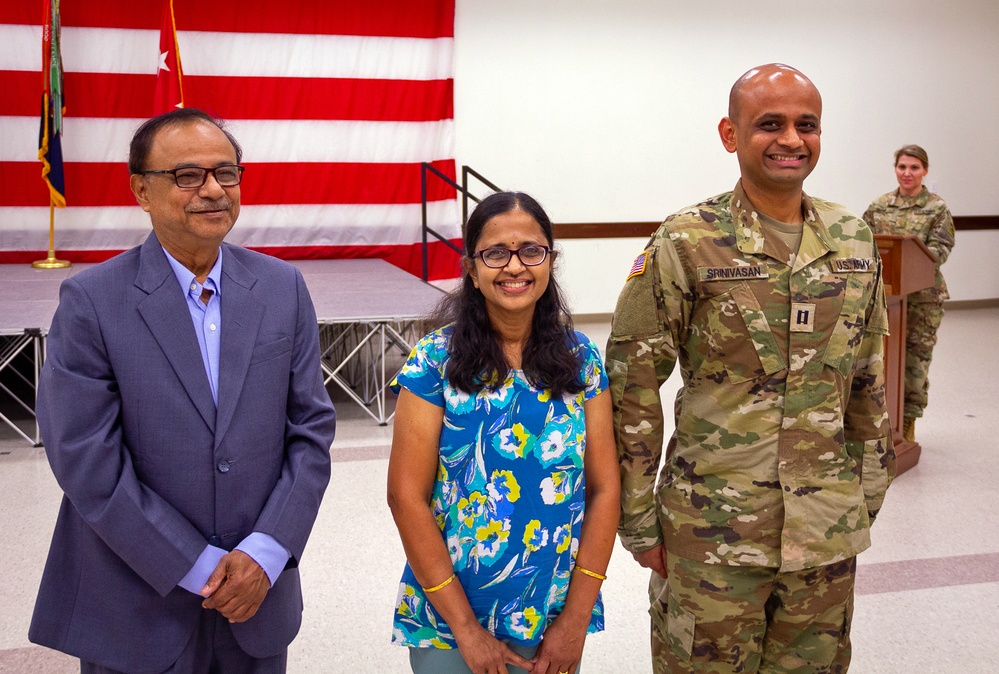 Newly Pinned Captain with His Parents