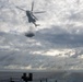 USS Ronald Reagan (CVN 76) conducts replenishment-at-sea with USNS Carl Brashear (T-AKE 7)