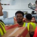 USS Ronald Reagan (CVN 76) Sailors transport cargo during a replenishment-at-sea