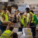 USS Ronald Reagan (CVN 76) Sailors transport cargo during a replenishment-at-sea