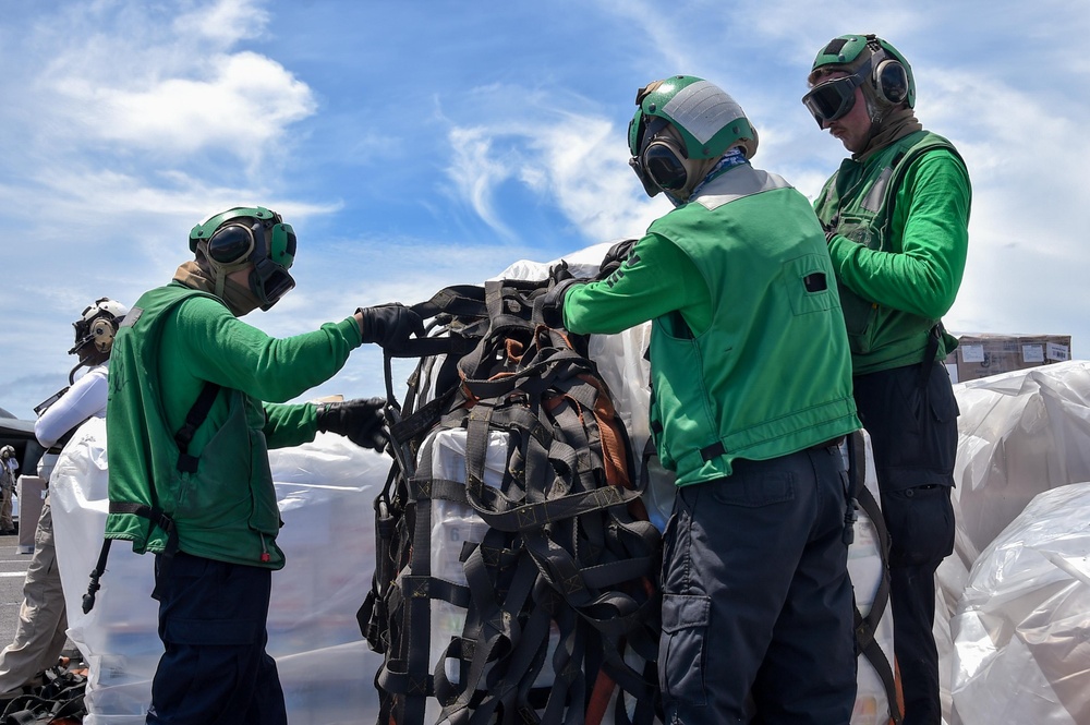 USS Ronald Reagan (CVN 76) conducts replenishment-at-sea with USNS Carl Brashear (T-AKE 7)