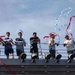 USS Ralph Johnson (DDG 114) Sailors enjoy a steel beach picnic on the ship’s flight deck to celebrate Independence Day in the Philippine Sea, July 4.