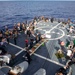 USS Ralph Johnson (DDG 114) Sailors enjoy a steel beach picnic on the ship’s flight deck to celebrate Independence Day in the Philippine Sea, July 4.