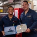 USS Rafael Peralta (DDG 115) conducts an award ceremony on the mess decks