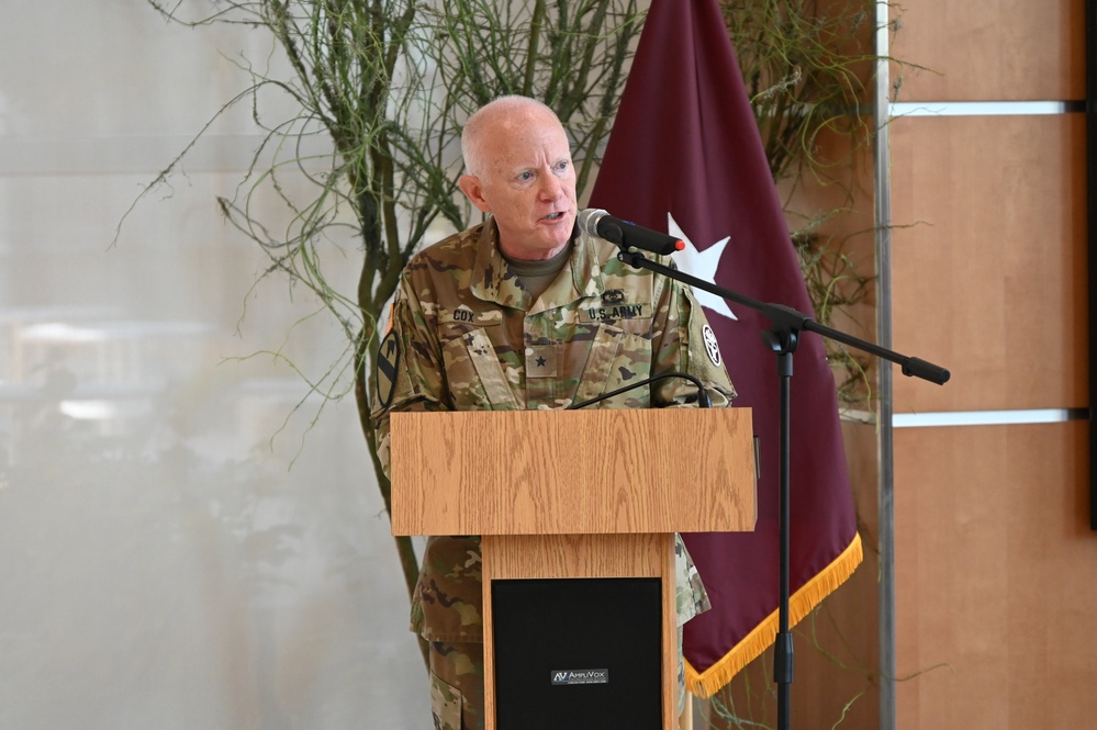 Brig. Gen. E. Darrin Cox, commander, Medical Readiness Command, West, addresses the audience during the Carl R. Darnall Army Medical Center change of command June 29.