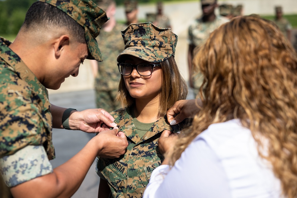 U.S. Marine husband and wife are promoted to sergeant per the Commandants Retention Program