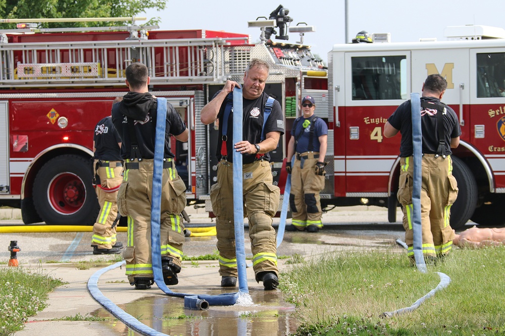 Selfridge Firefighters Train in Realistic Scenarios Inside Hangar Under Demolition