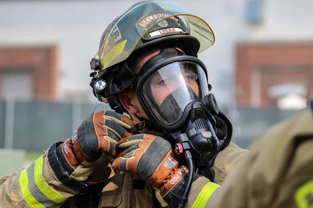 Selfridge Firefighters Train in Realistic Scenarios Inside Hangar Under Demolition.