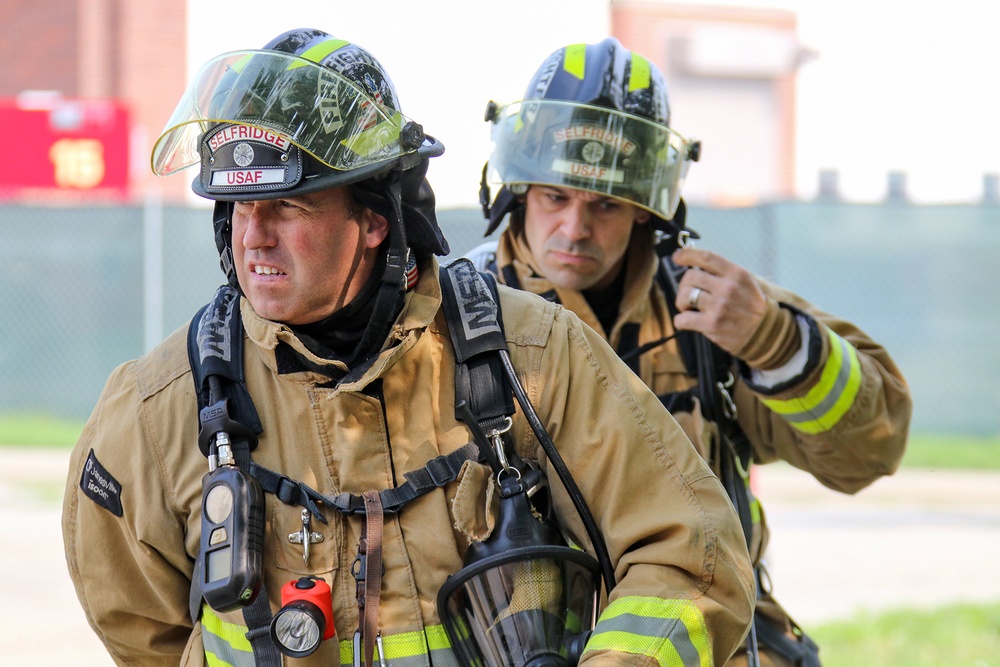 Selfridge Firefighters Train in Realistic Scenarios Inside Hangar Under Demolition.