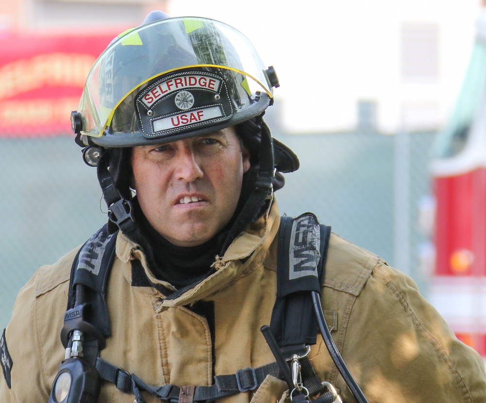 Selfridge Firefighters Train in Realistic Scenarios Inside Hangar Under Demolition.