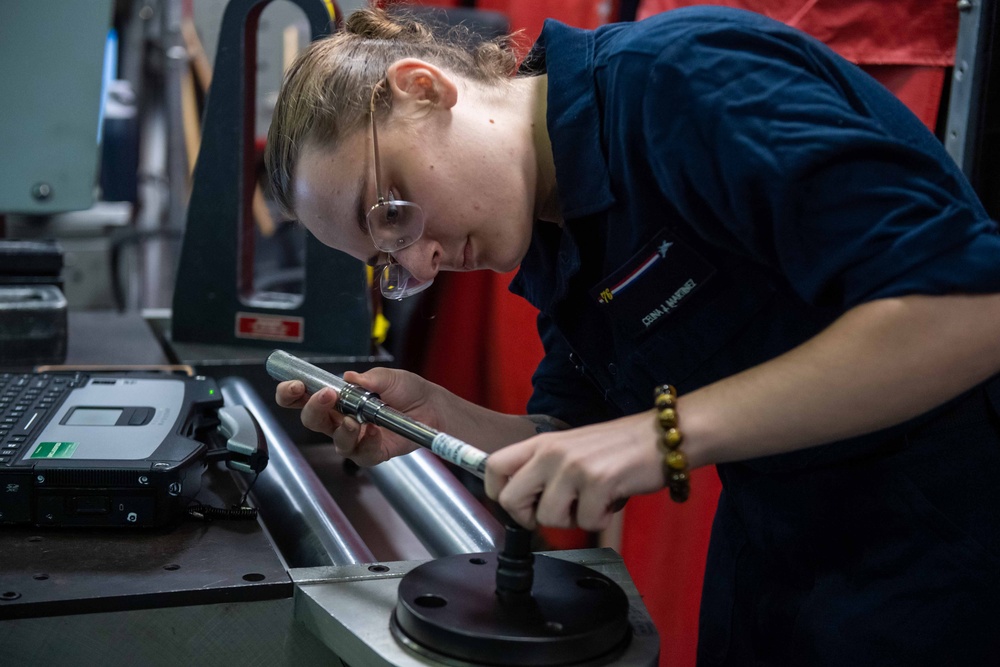 USS Ronald Reagan (CVN 76) Sailors perform daily maintenance