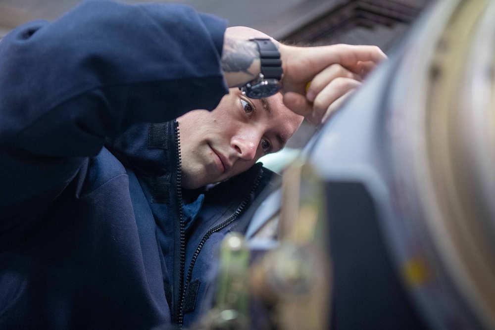 USS Ronald Reagan (CVN 76) Sailors perform daily maintenance