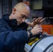 USS Ronald Reagan (CVN 76) Sailors perform daily maintenance