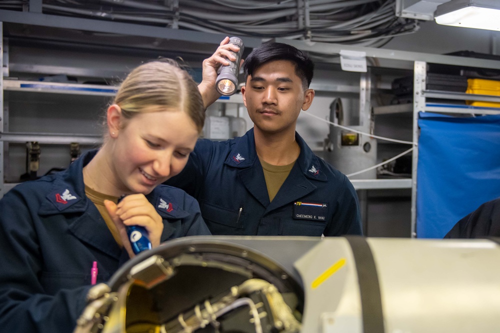 USS Ronald Reagan (CVN 76) Sailors perform daily maintenance