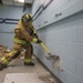 Selfridge Firefighters Train in Realistic Scenarios Inside Hangar Under Planned Demolition.