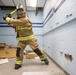 Selfridge Firefighters Train in Realistic Scenarios Inside Hangar Under Demolition.