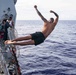 USS Ralph Johnson (DDG 114) Sailors enjoy swim call in the Philippine Sea, July 4