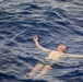 USS Ralph Johnson (DDG 114) Sailors enjoy swim call in the Philippine Sea, July 4