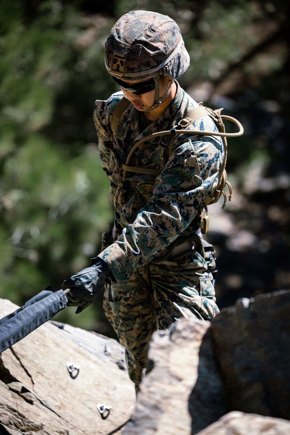 U.S. Marines with 4th Marine Division conduct rappelling training during Mountain Exercise 4-23