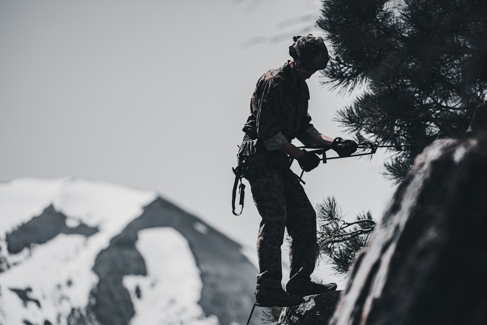 U.S. Marines with 4th Marine Division conduct ropes and rappelling training during Mountain Warfare Training Exercise 4-23