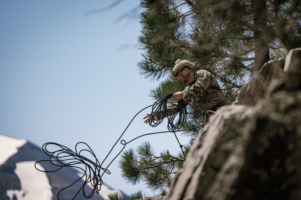 U.S. Marines with 4th Marine Division conduct ropes and rappelling training during Mountain Warfare Training Exercise 4-23