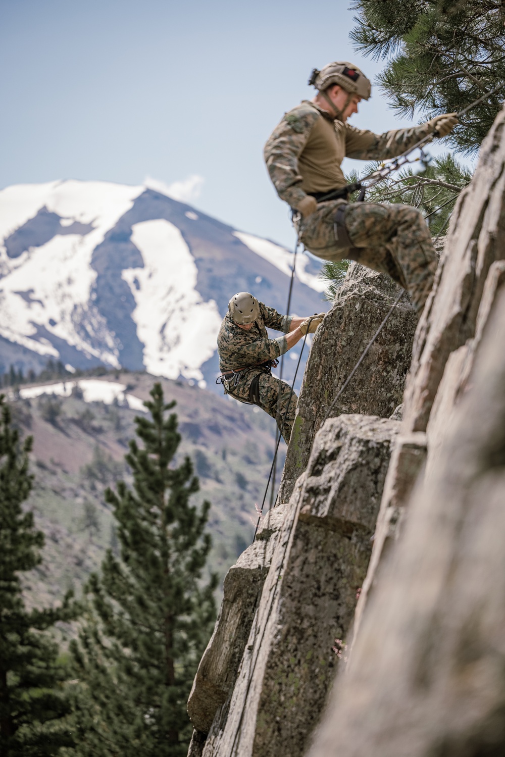 U.S. Marines with 4th Marine Division conduct ropes and rappelling training during Mountain Warfare Training Exercise 4-23