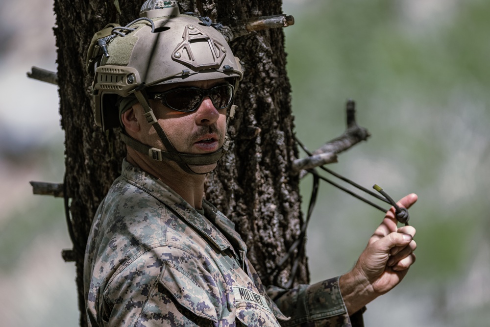 U.S. Marines with 4th Marine Division conduct ropes and rappelling training during Mountain Warfare Training Exercise 4-23