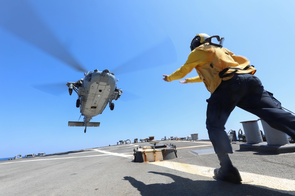 Sailor Guides Helicopter Takeoff