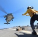 Sailor Guides Helicopter Takeoff