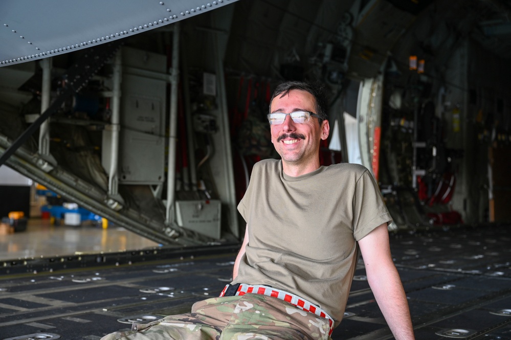 165th Airlift Wing Maintainers work together with Kentucky ANG maintainers to complete inspection on C-130J during Air Defender 2023