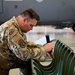 165th Airlift Wing Maintainers work together with Kentucky ANG maintainers to complete inspection on C-130J during Air Defender 2023