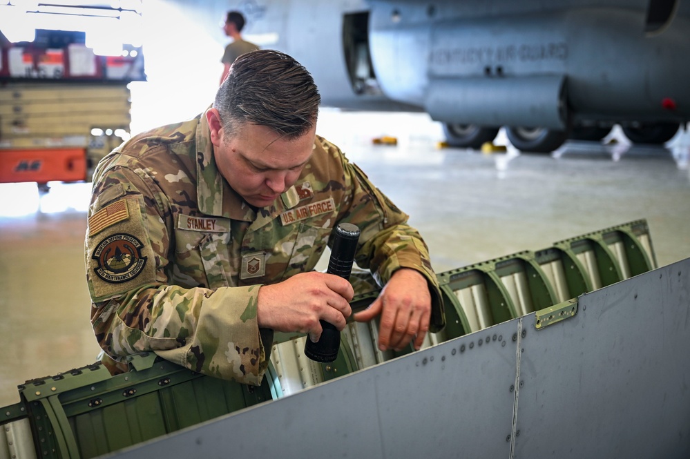 165th Maintainers work together with Kentucky ANG maintainers to complete inspection on C-130J during Air Defender 2023