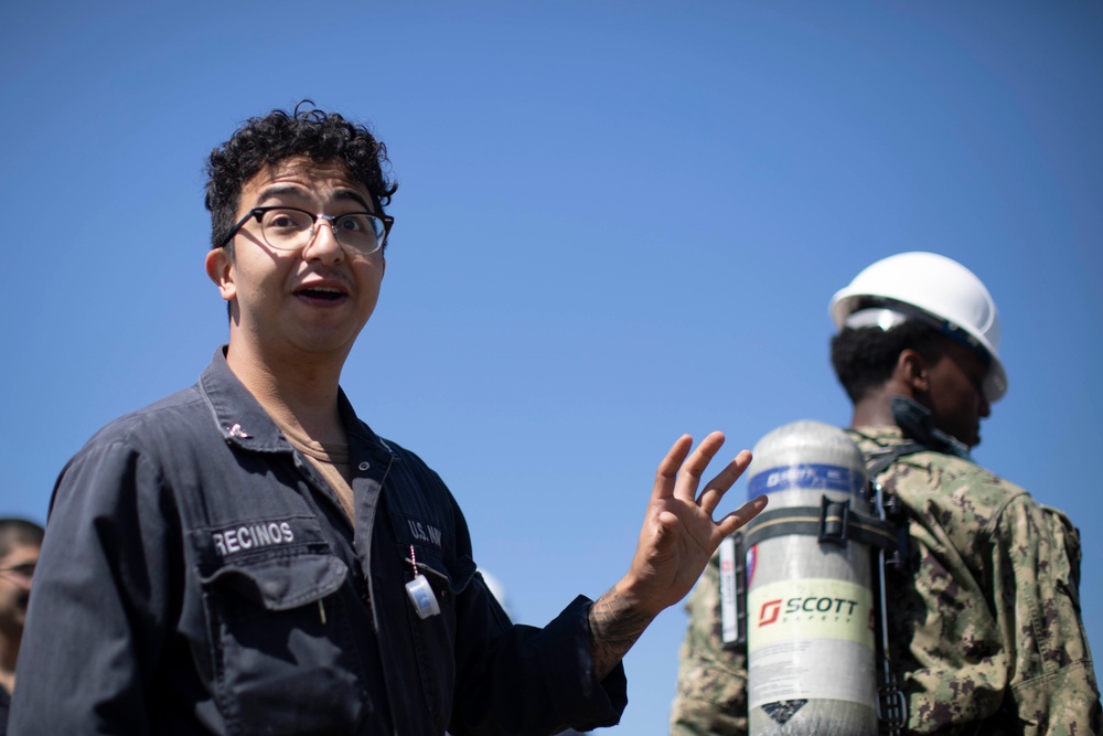 Midshipmen From U.S. Naval Academy Tour USS Tripoli