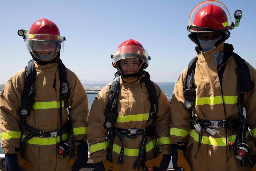 Midshipmen From U.S. Naval Academy Tour USS Tripoli