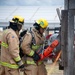 Firefighter recruits participate in firefighting drills