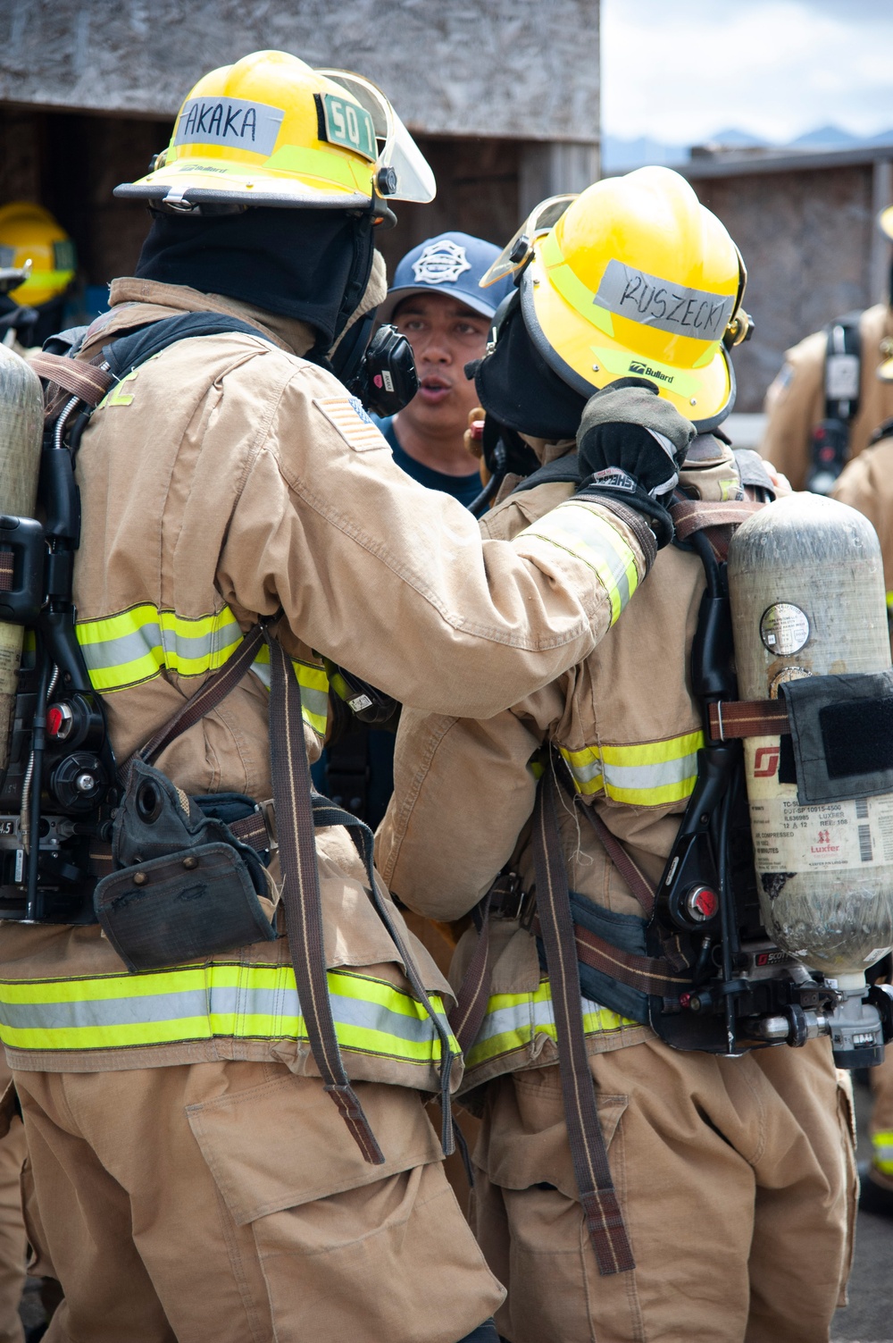 Firefighter recruits participate in firefighting drills