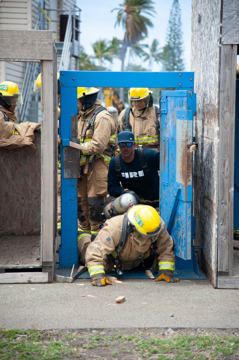 Firefighter recruits participate in firefighting drills