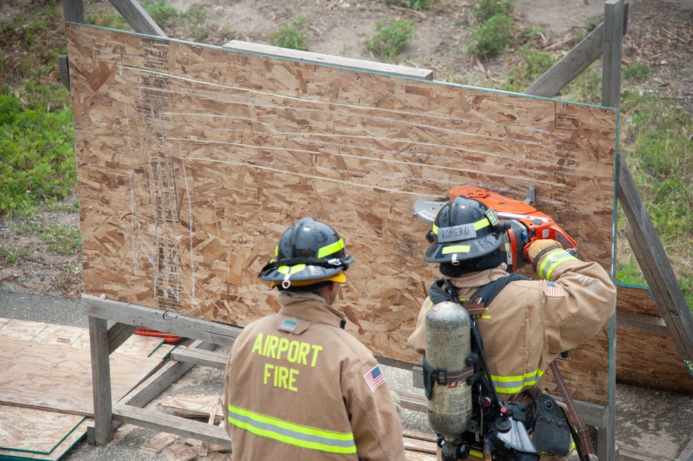 Firefighter recruits participate in firefighting drills